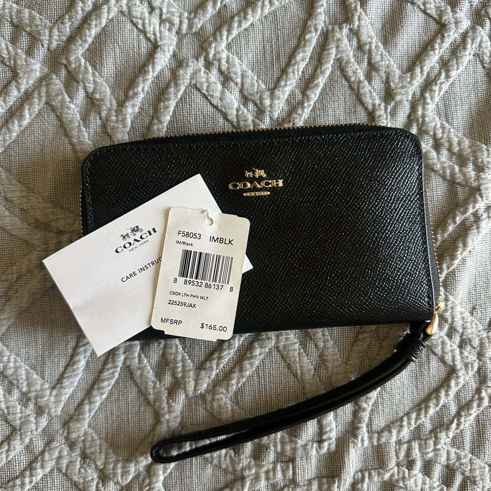 Coach wristlet zip around black pebble wallet